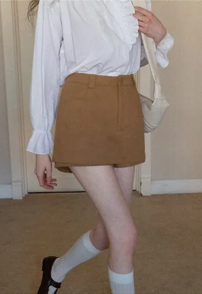 High waist pleated mini skirt with button front design