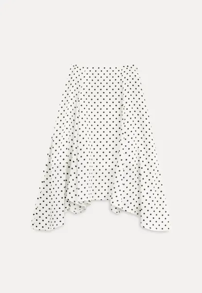 Polka dot asymmetrical hem skirt with pleats