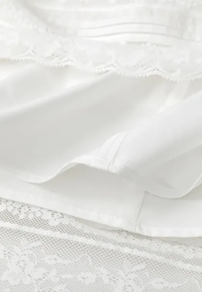 Lace Trimmed Pleated Midi Skirt