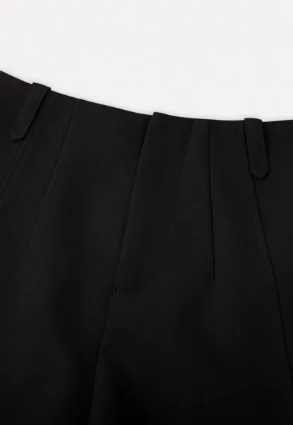 High waist pleated shorts with flared hem