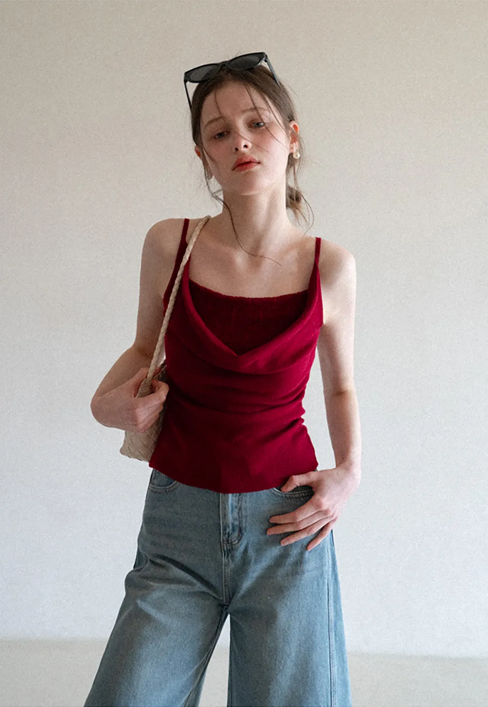 Silk-like tank top with thin straps and draped neckline