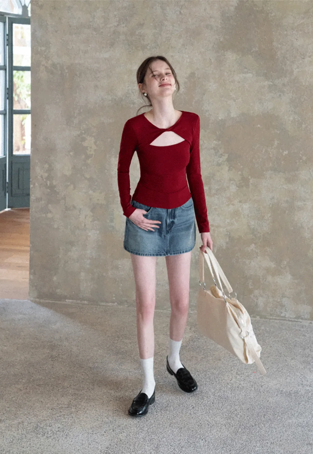 Long sleeve top with front cutout detail