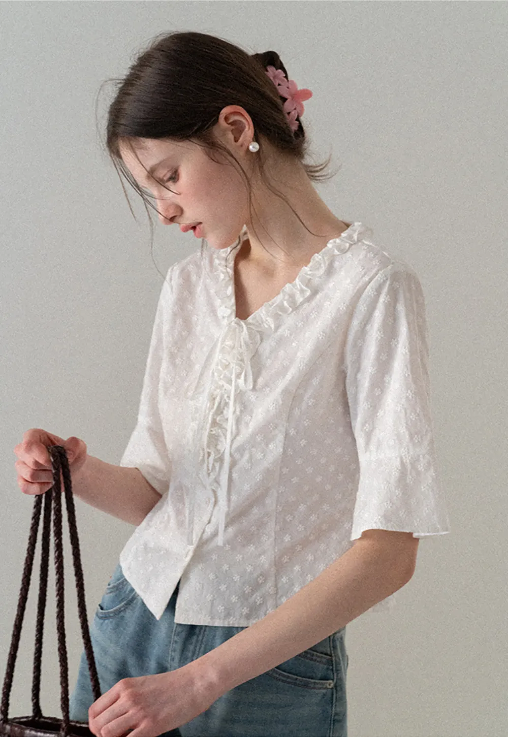 V neck blouse with lace trim and tie front