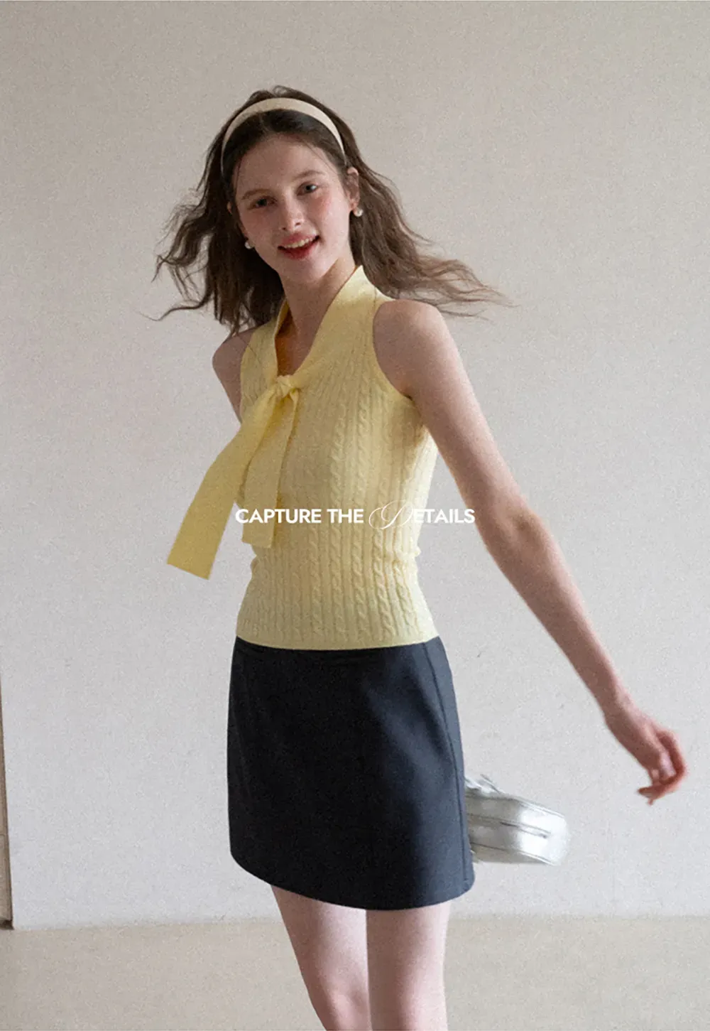 Knit Sleeveless Top with Front Bow Detail