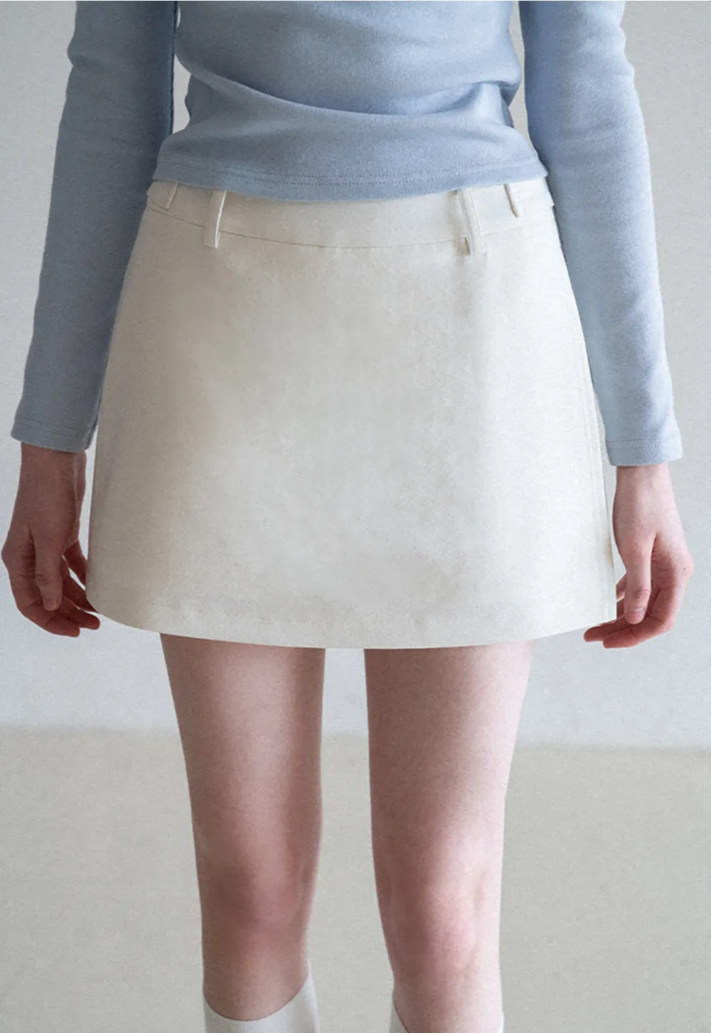 Elegant Pleated Mini Skirt with Asymmetrical Hem