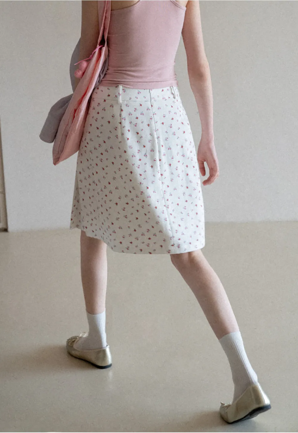 Pleated skirt with floral print