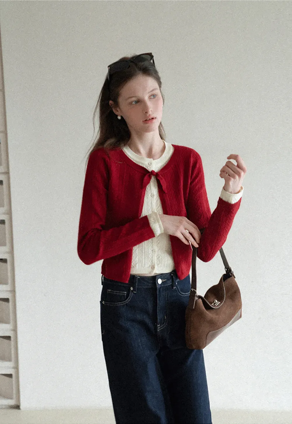 Elegant Knit Cardigan with Bow Detail and Ribbed Texture