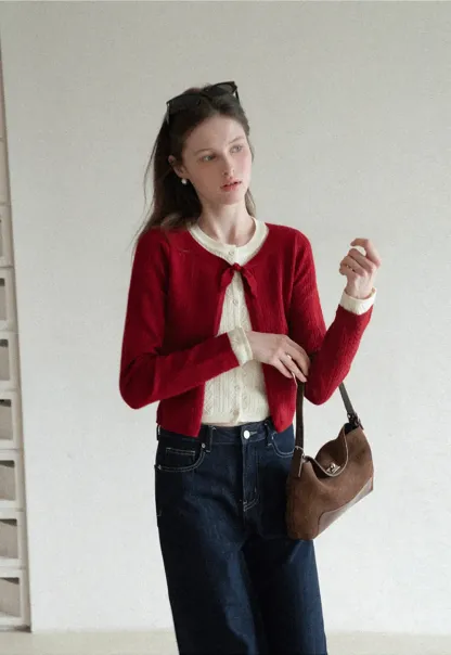 Elegant Knit Cardigan with Bow Detail and Ribbed Texture