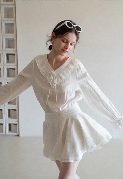 Long sleeve dress with lace collar and tie front