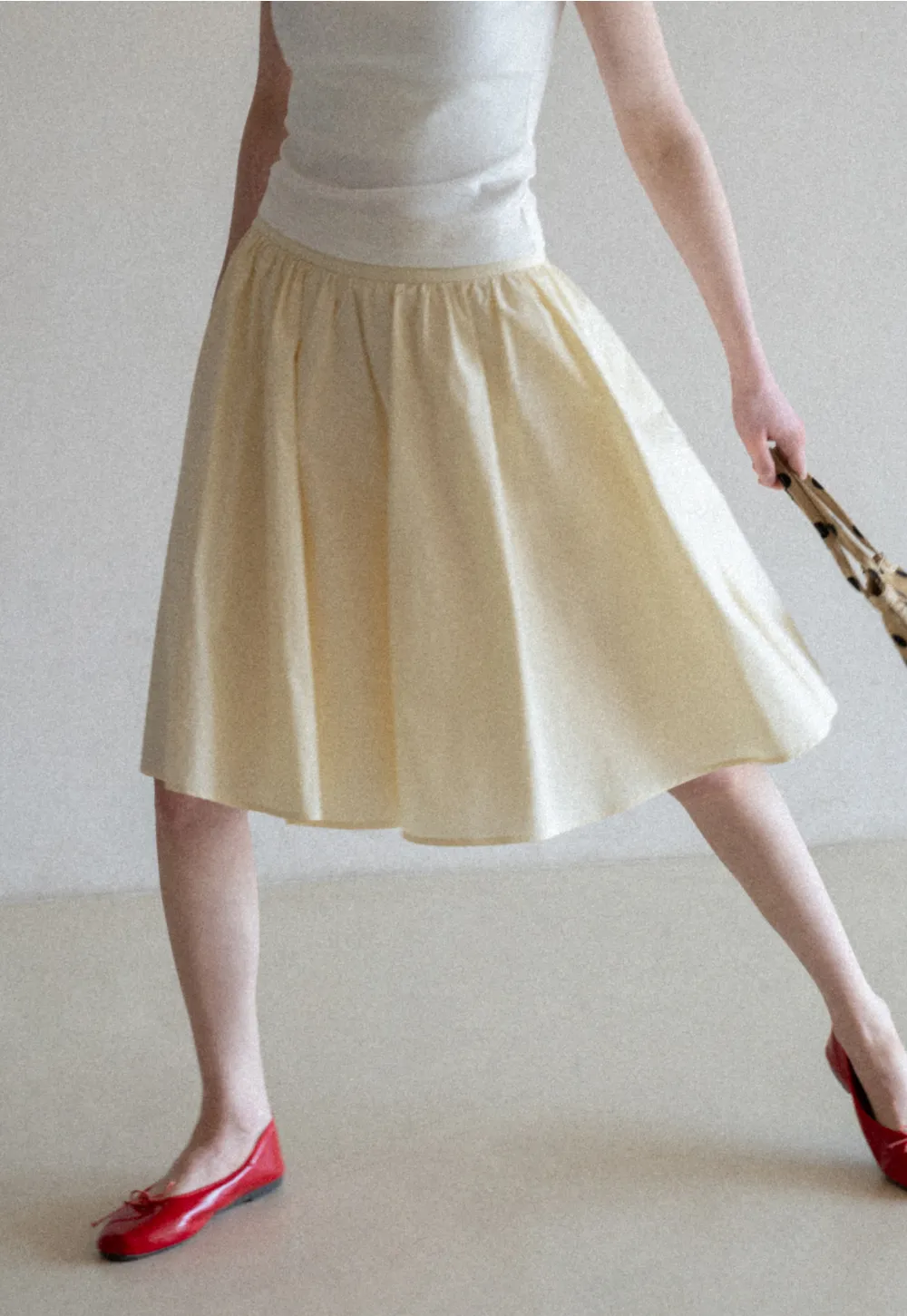 A-line pleated midi skirt with waistband