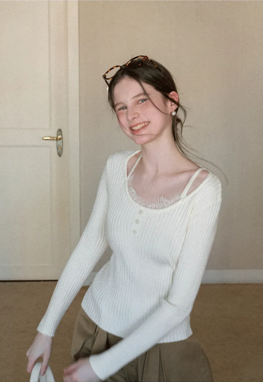 Ribbed knit sweater with boat neck and long sleeves