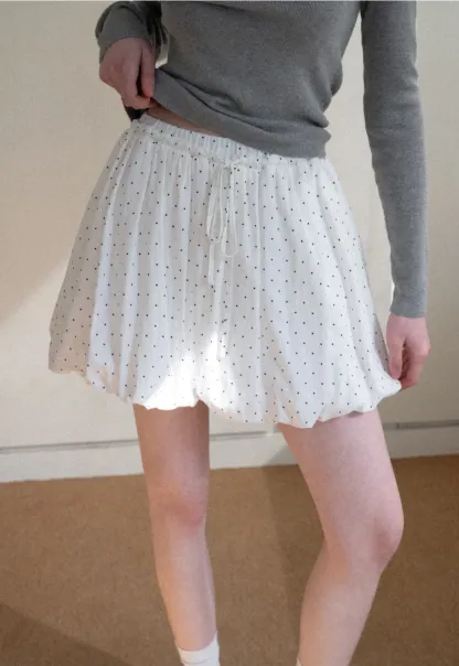 Polka dot pleated mini skirt with drawstring waist