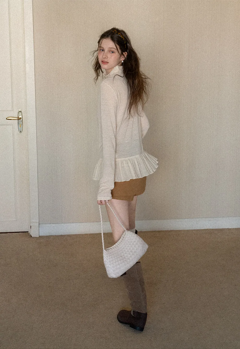 High waist pleated mini skirt with button front design