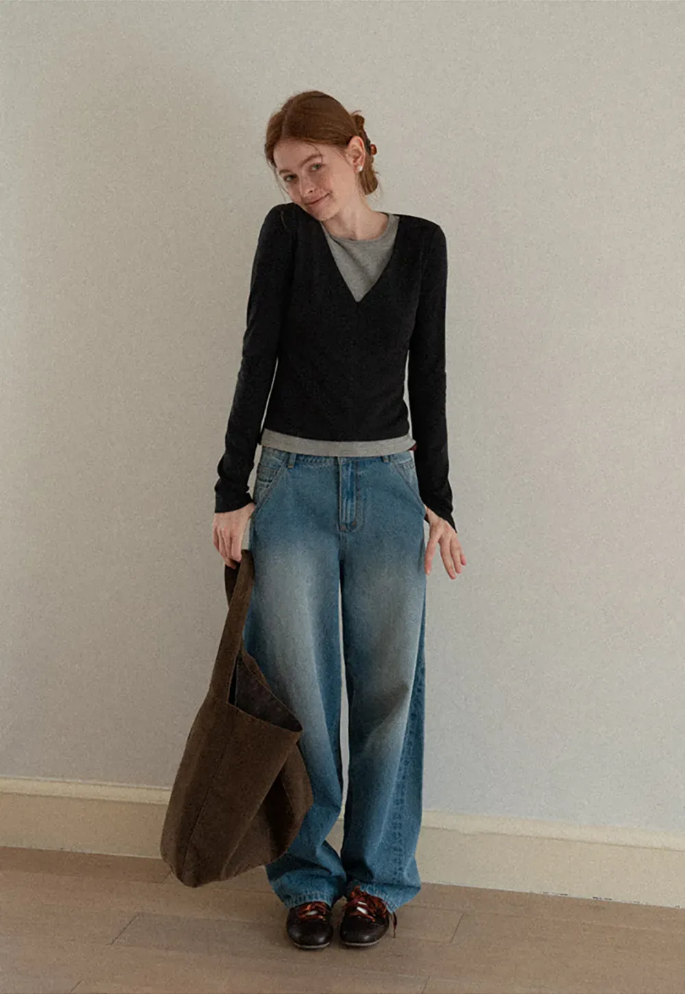 Long sleeve crop top with round neck and hem stitching design