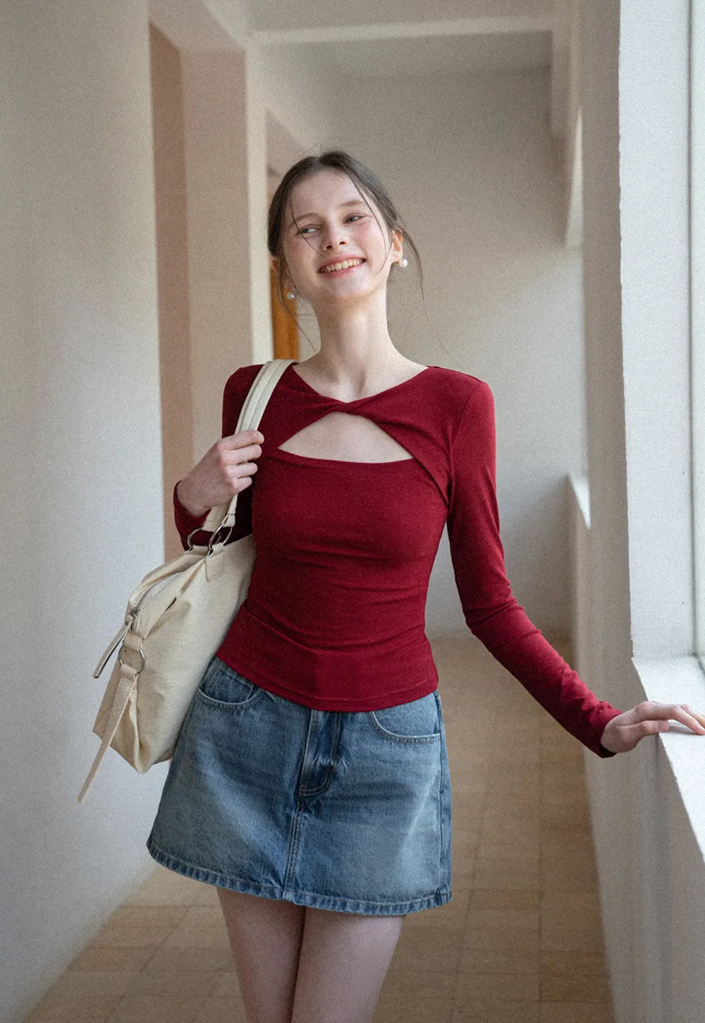 Long sleeve top with front cutout detail