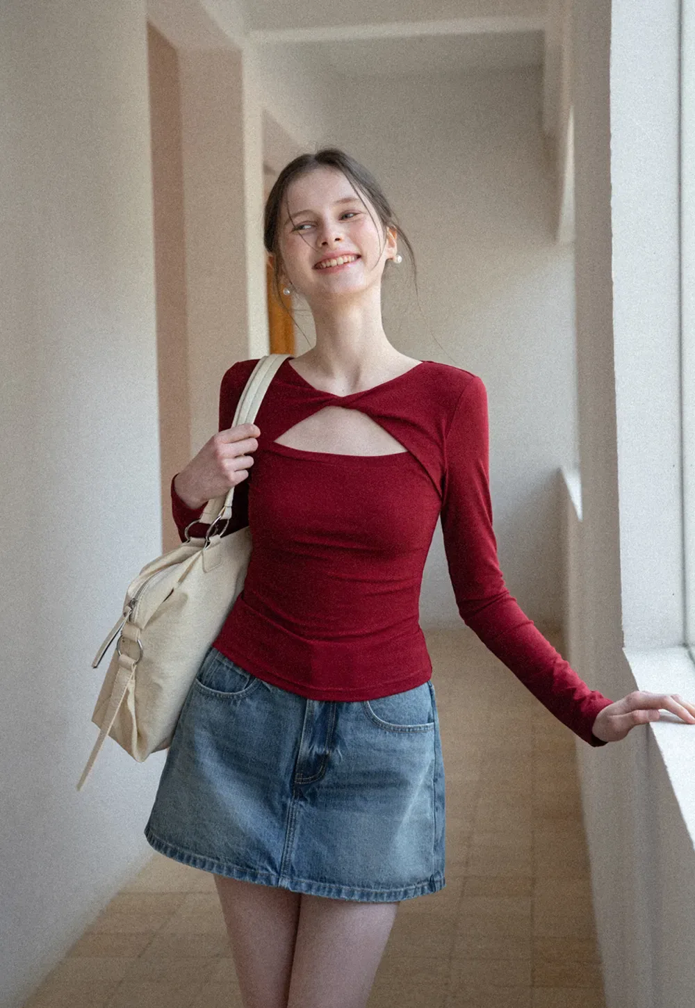 Long sleeve top with front cutout detail