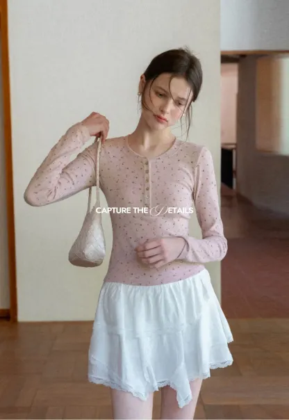 Long sleeve button front top with floral print