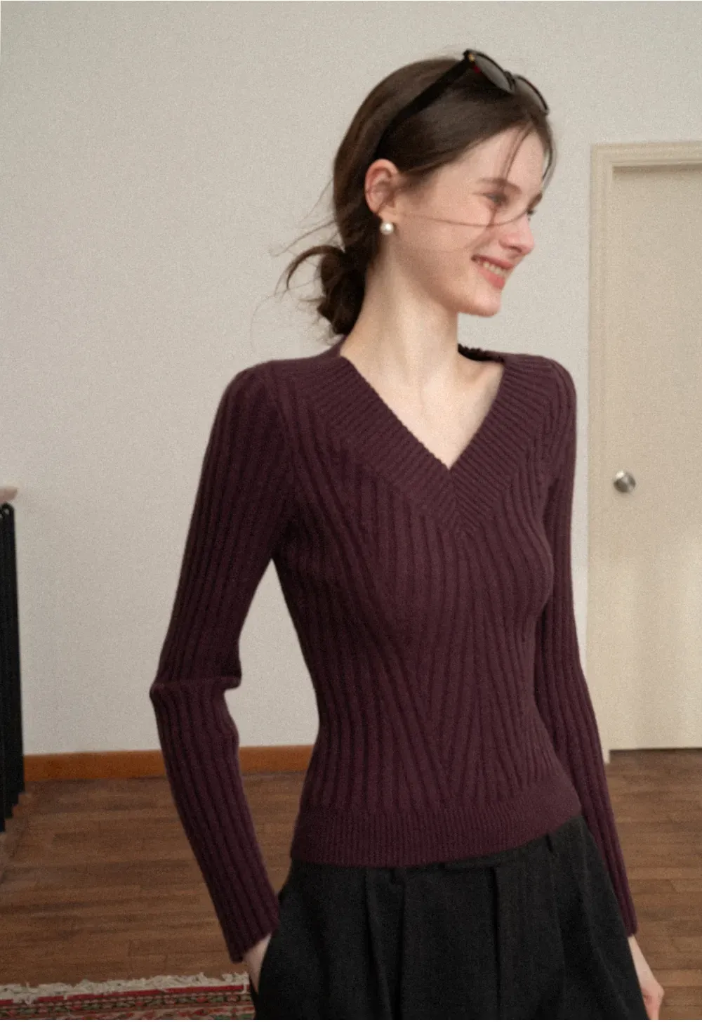 Elegant Ribbed Knit Sweater with V-Neck Design