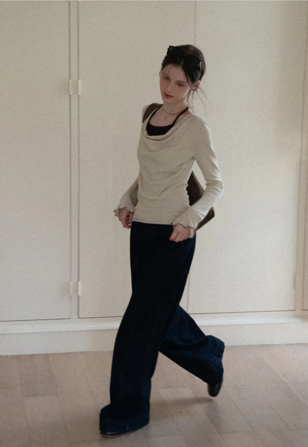 Beige Long-Sleeve Top with Ruffled Hem and Bow Tie Back