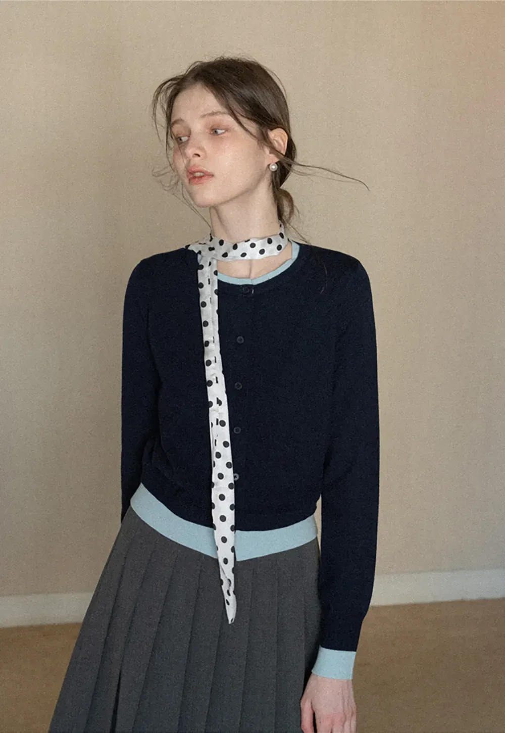 Elegant polka dot neck tie with bow design for women's fashion.