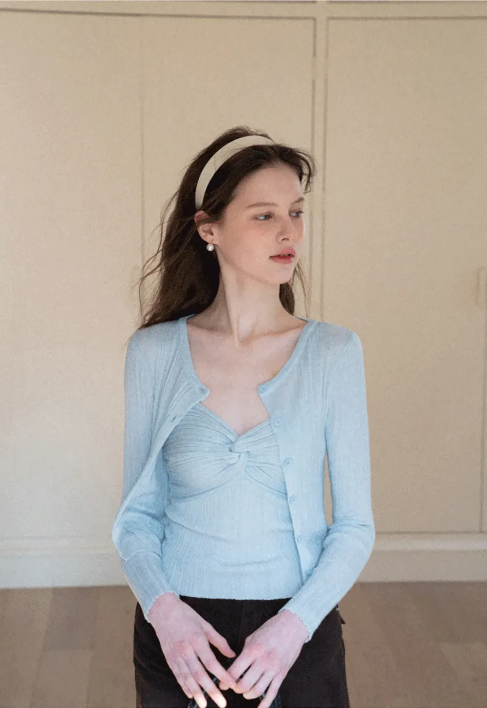 Ribbed knit sweater with V neckline and long sleeves