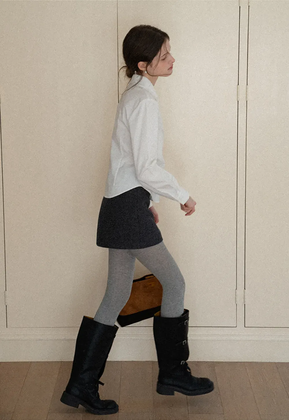 A-line mini skirt with textured fabric and central seam design