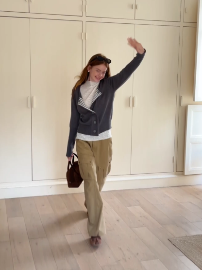 Elegant textured long sleeve top with subtle pattern design