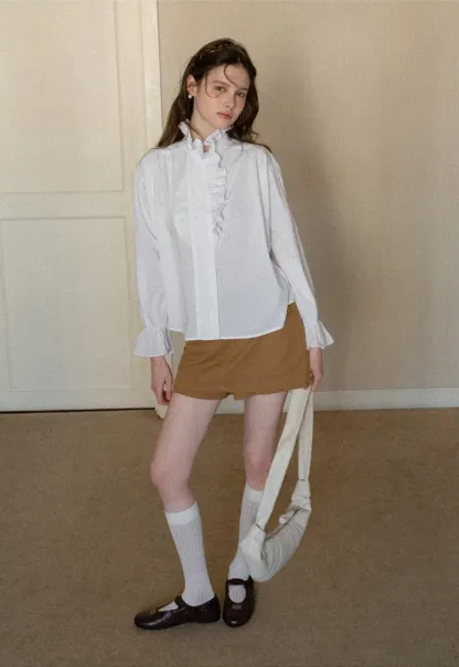 High waist pleated mini skirt with button front design