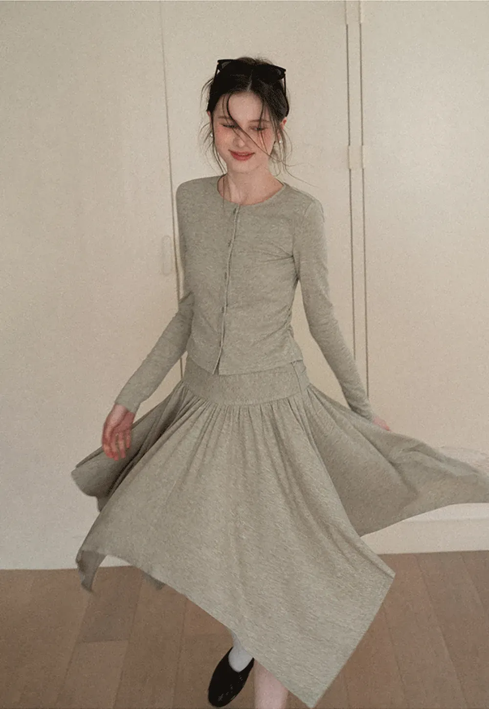 Long sleeve button front top and asymmetrical skirt