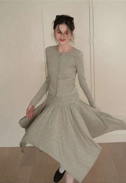 Long sleeve button front top and asymmetrical skirt