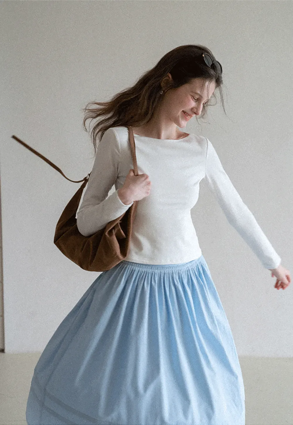 Lightweight pleated midi skirt with elastic waist