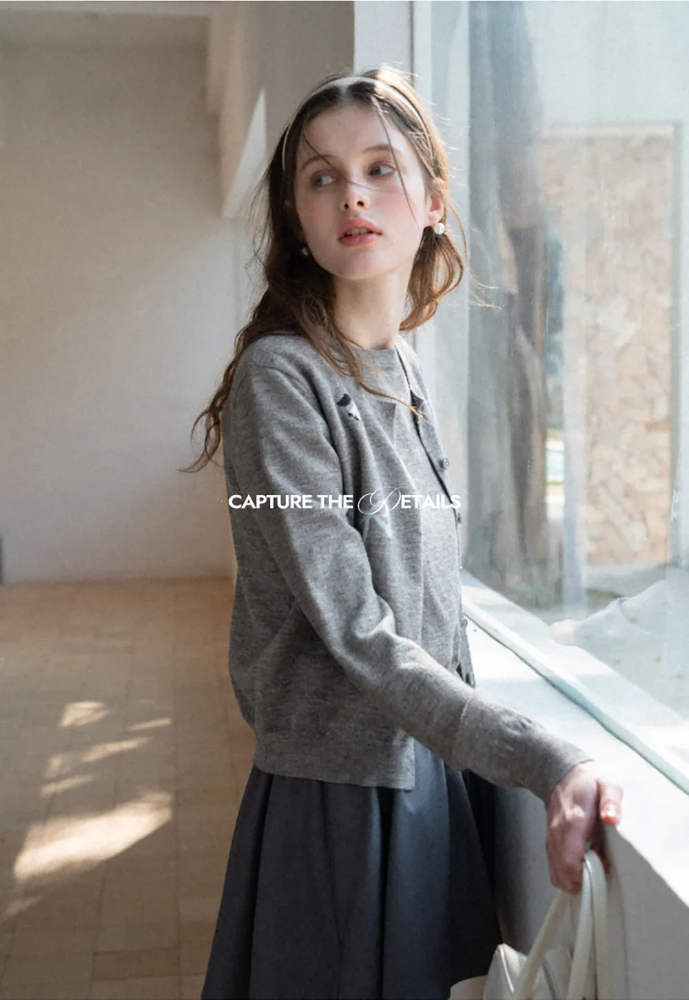 Woolen knit sweater with horse and bow motifs