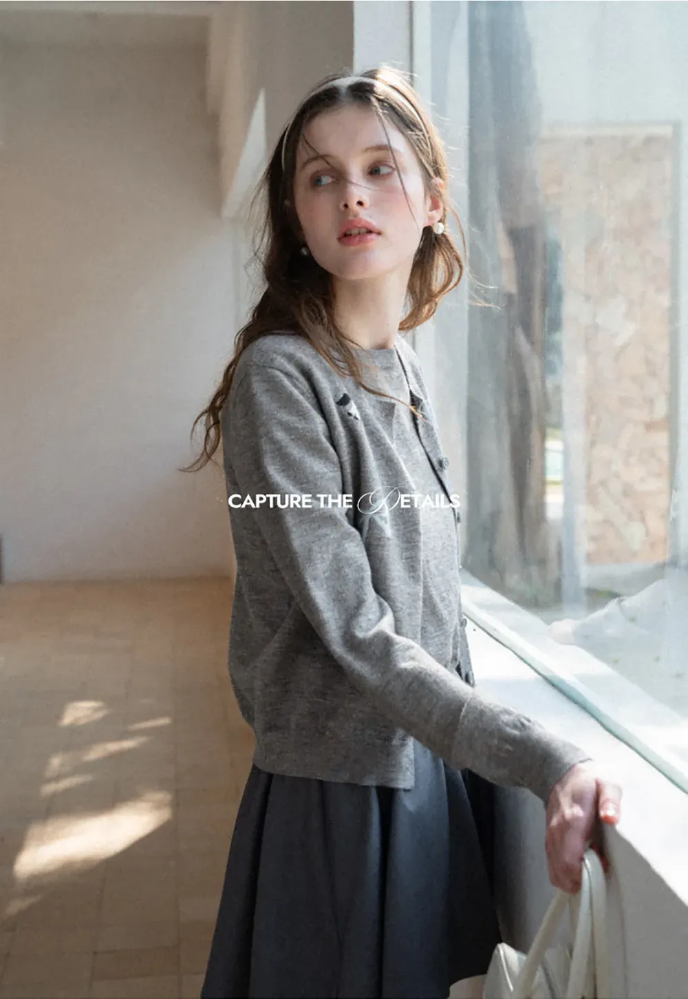 Woolen knit sweater with horse and bow motifs