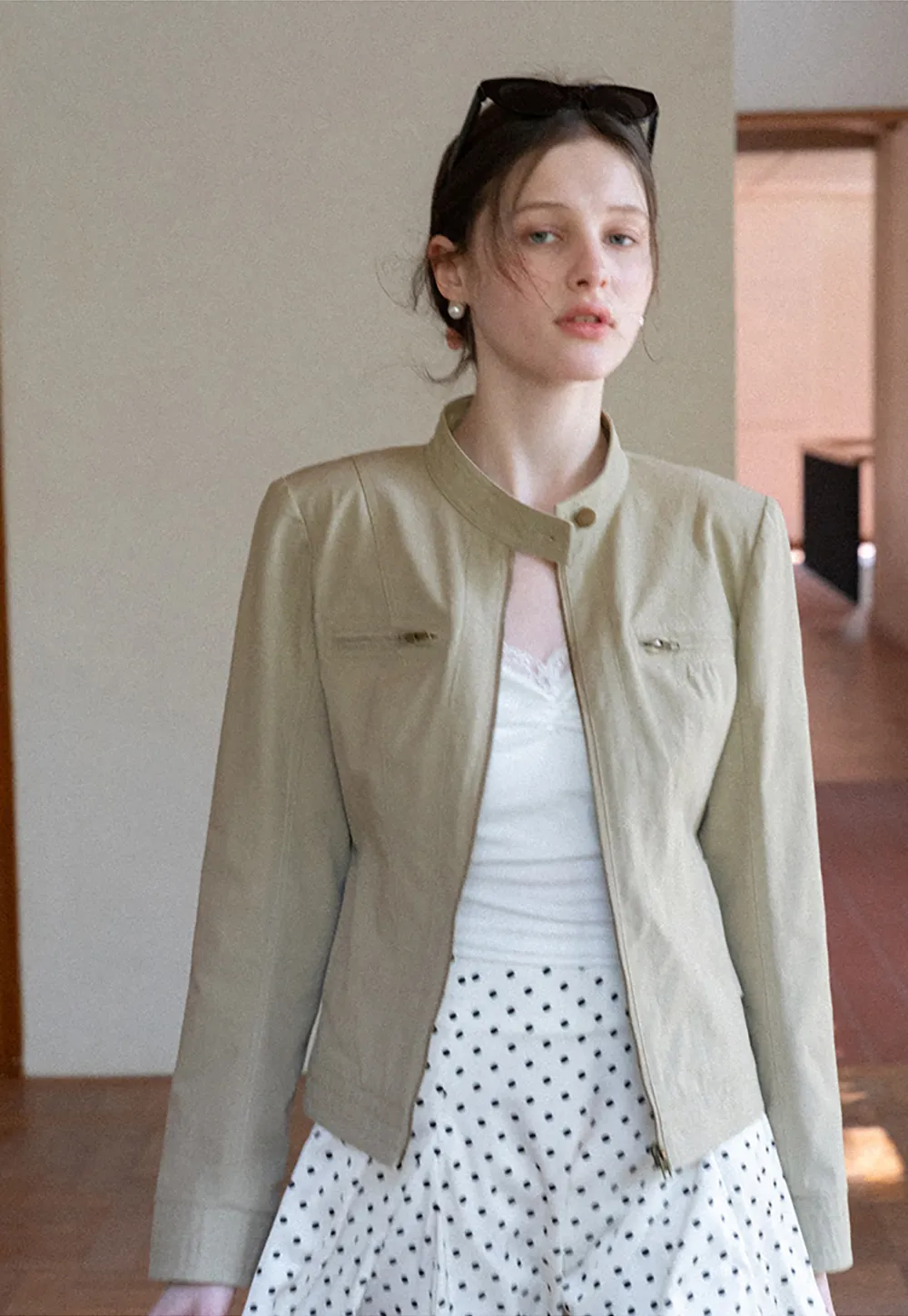 Short jacket with stand collar and front pockets