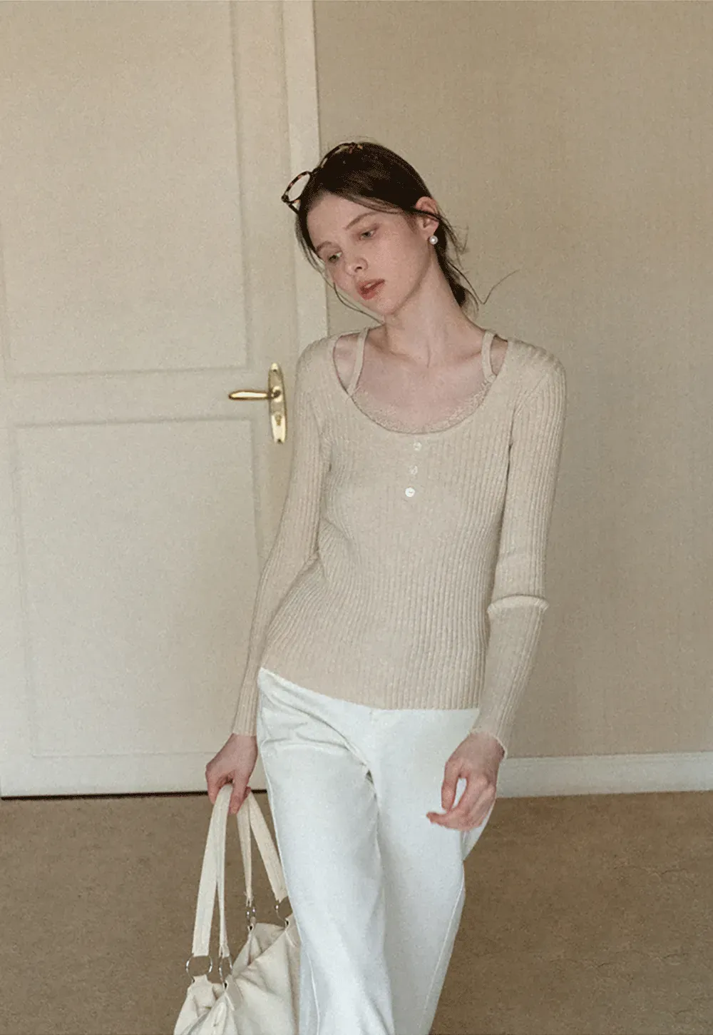 Ribbed knit sweater with boat neck and long sleeves