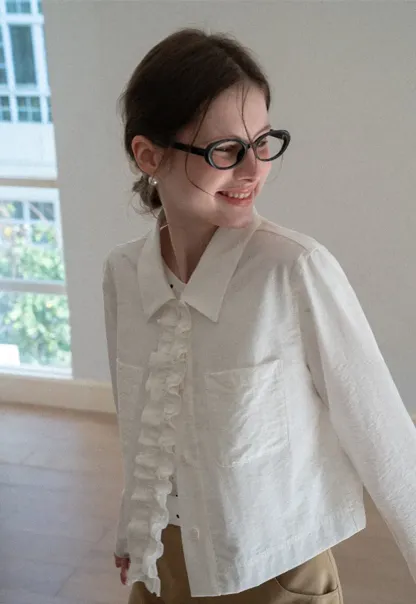 Short jacket with ruffled front placket and collar