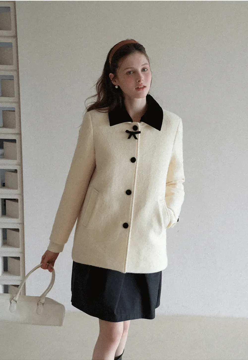 Elegant Wool Coat with Bow Detail and Contrasting Collar