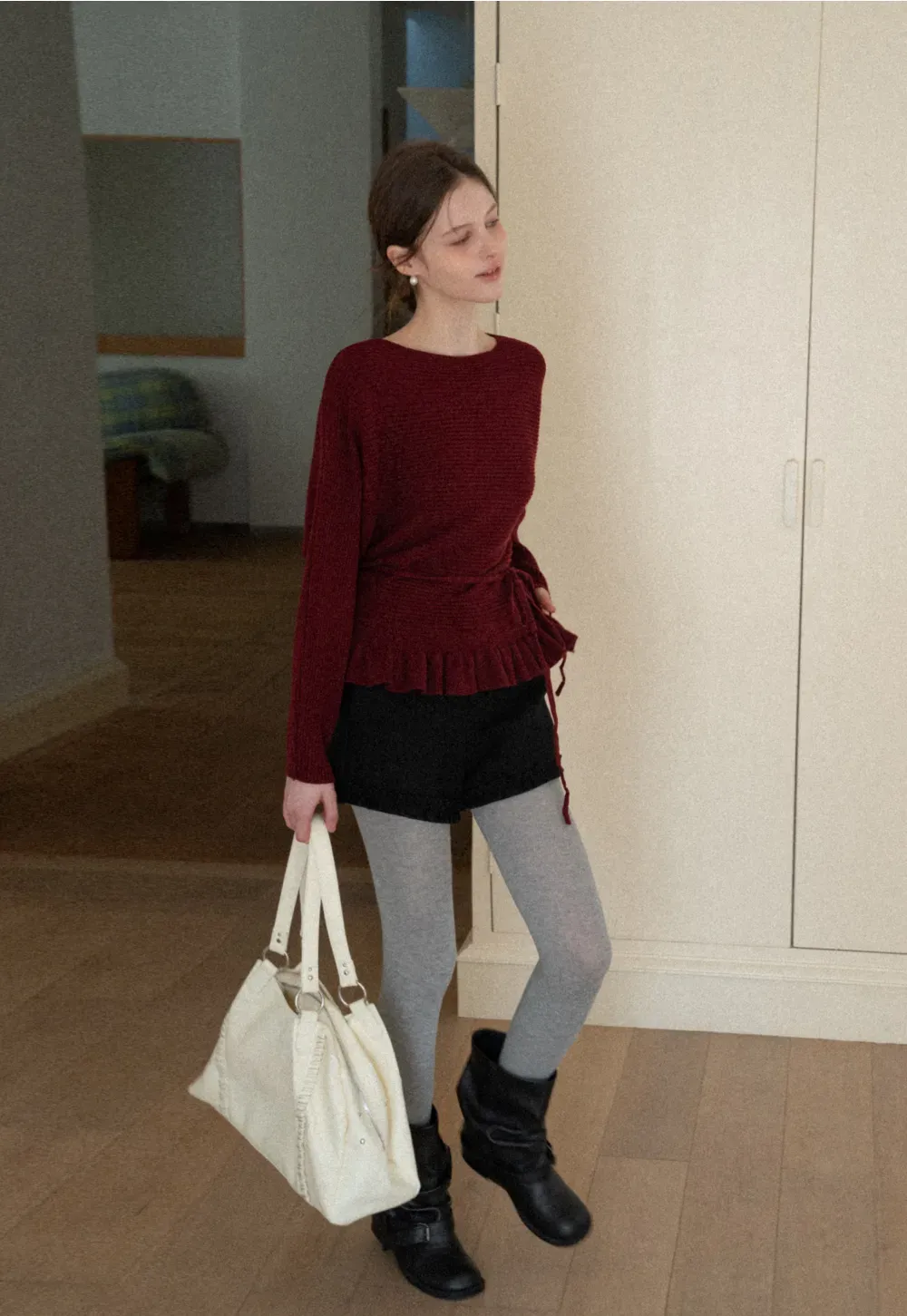 High waist shorts with ruffle hem and belt design