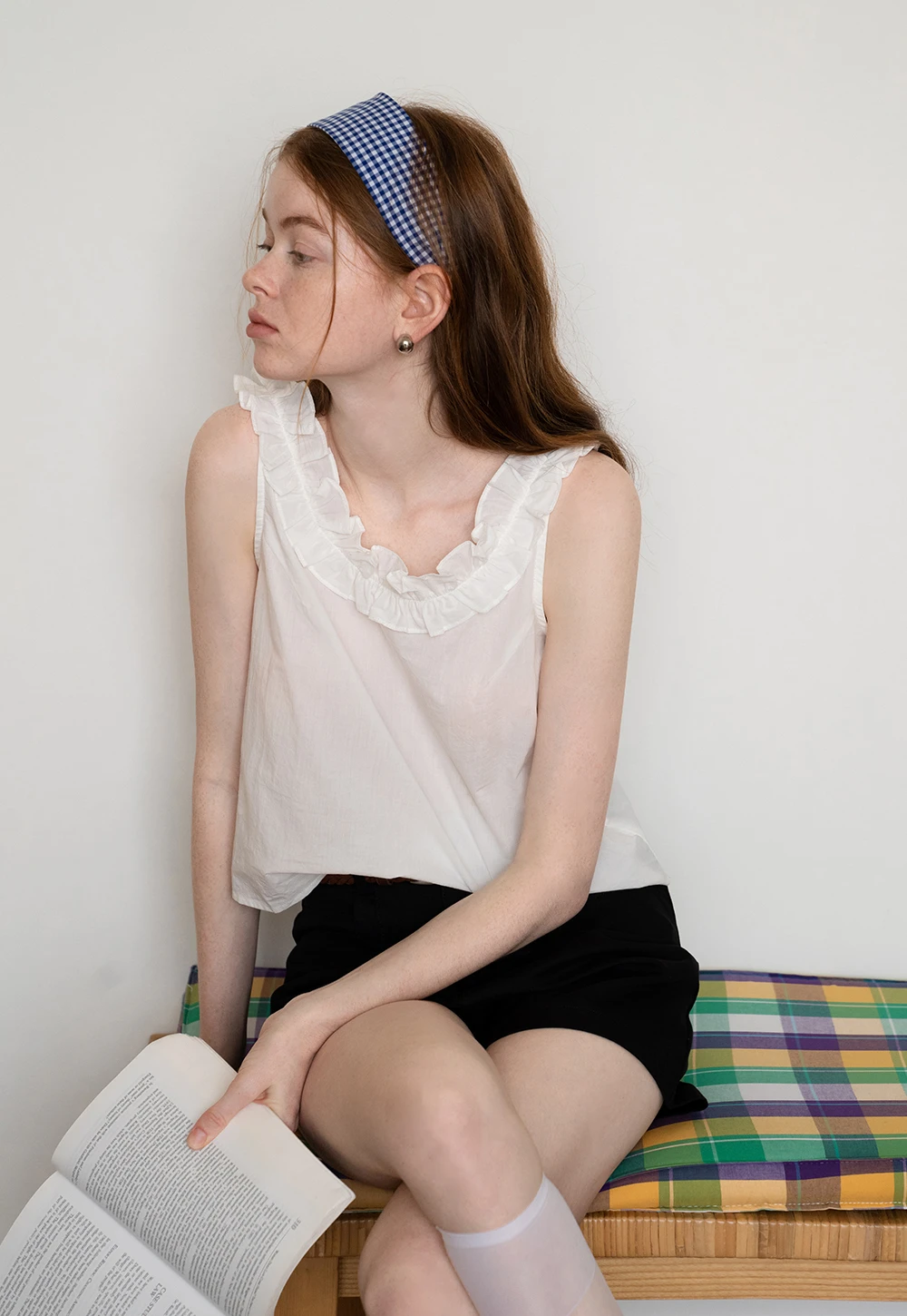 Women’s Sleeveless Top with Ruffle Neckline
