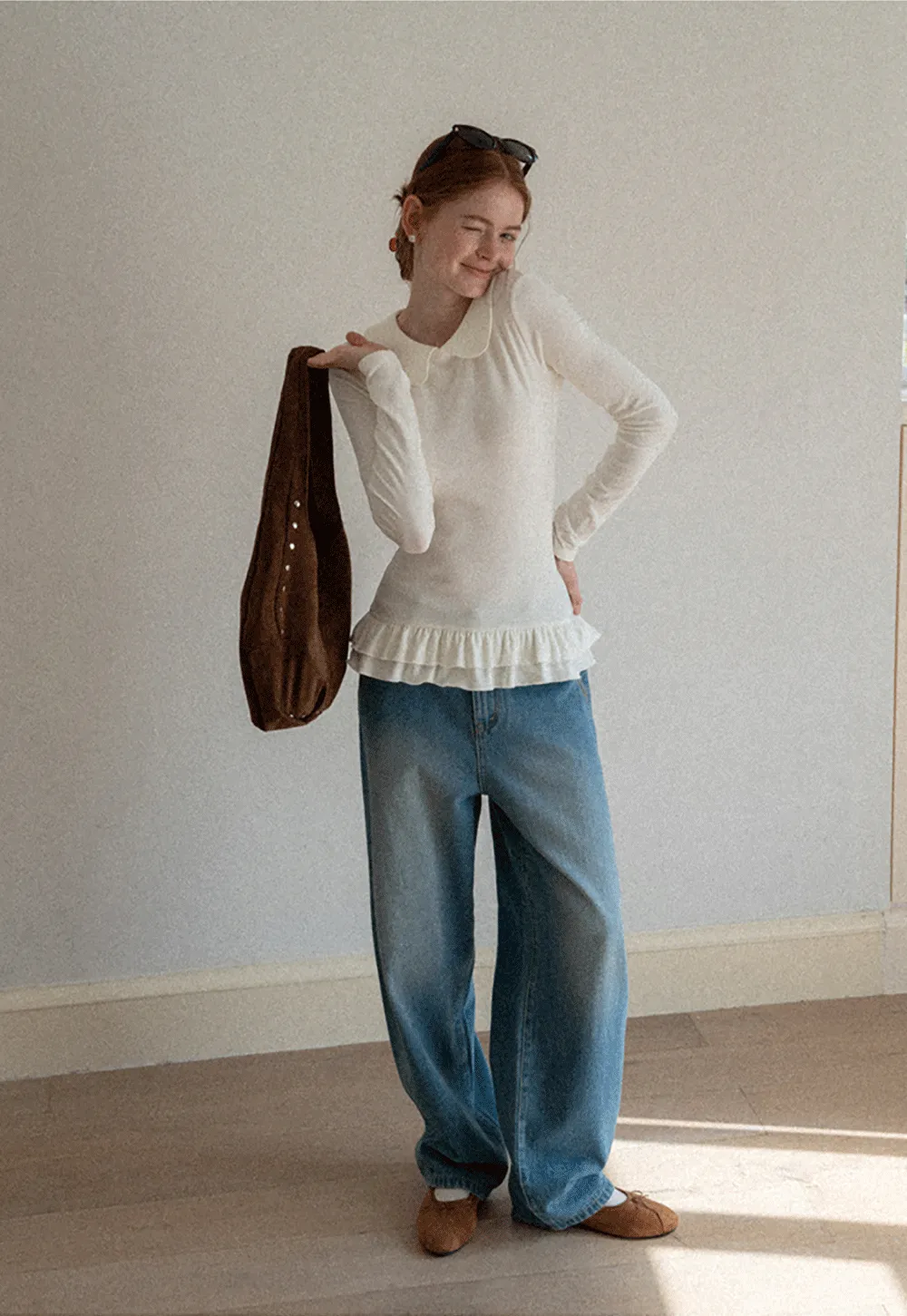 Elegant Long Sleeve Top with Ruffled Hem and Collar Design