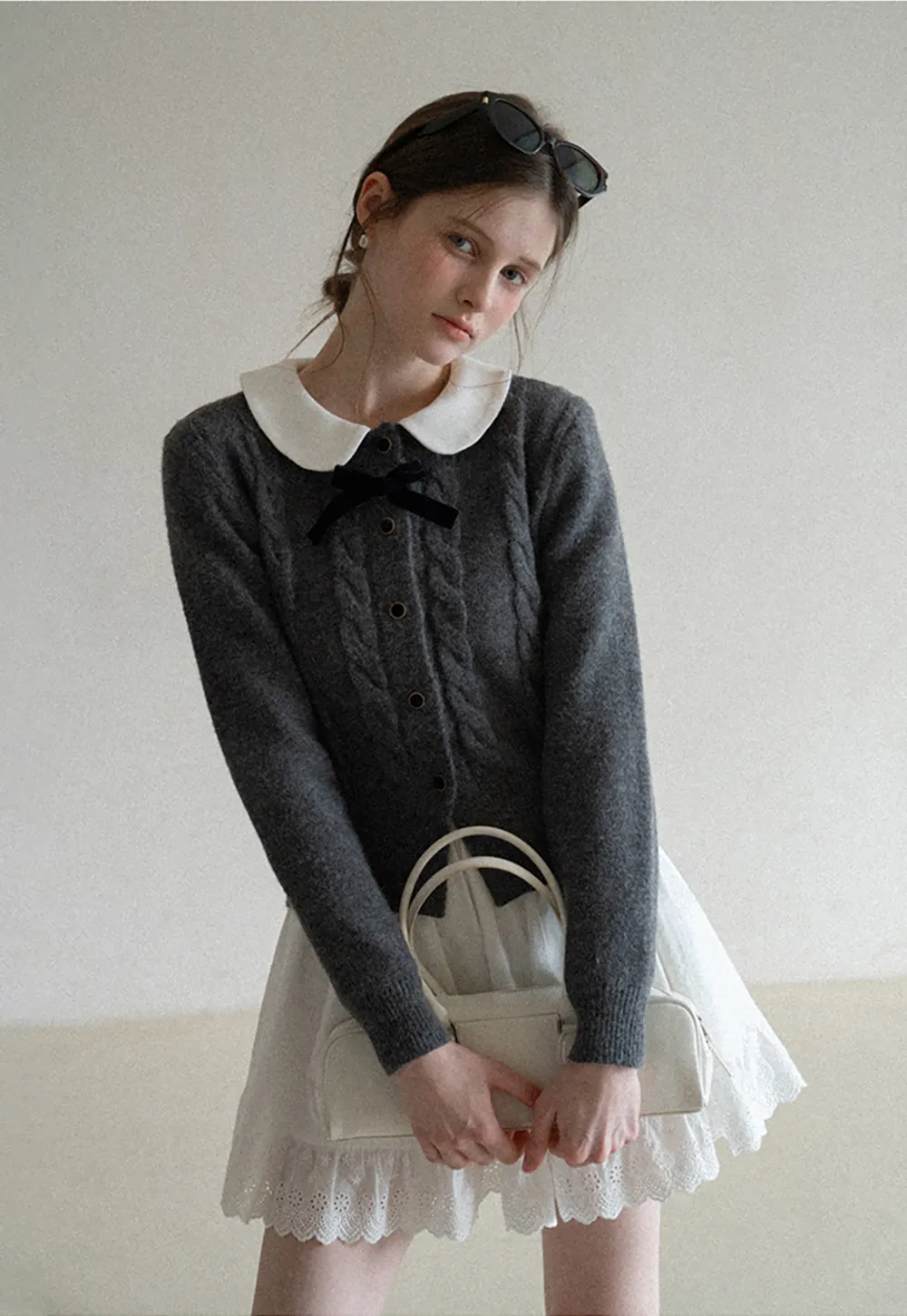 Elegant Cable Knit Cardigan with Bow Detail