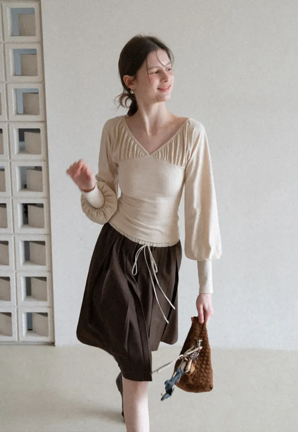 V neck long sleeve top with ruched detail