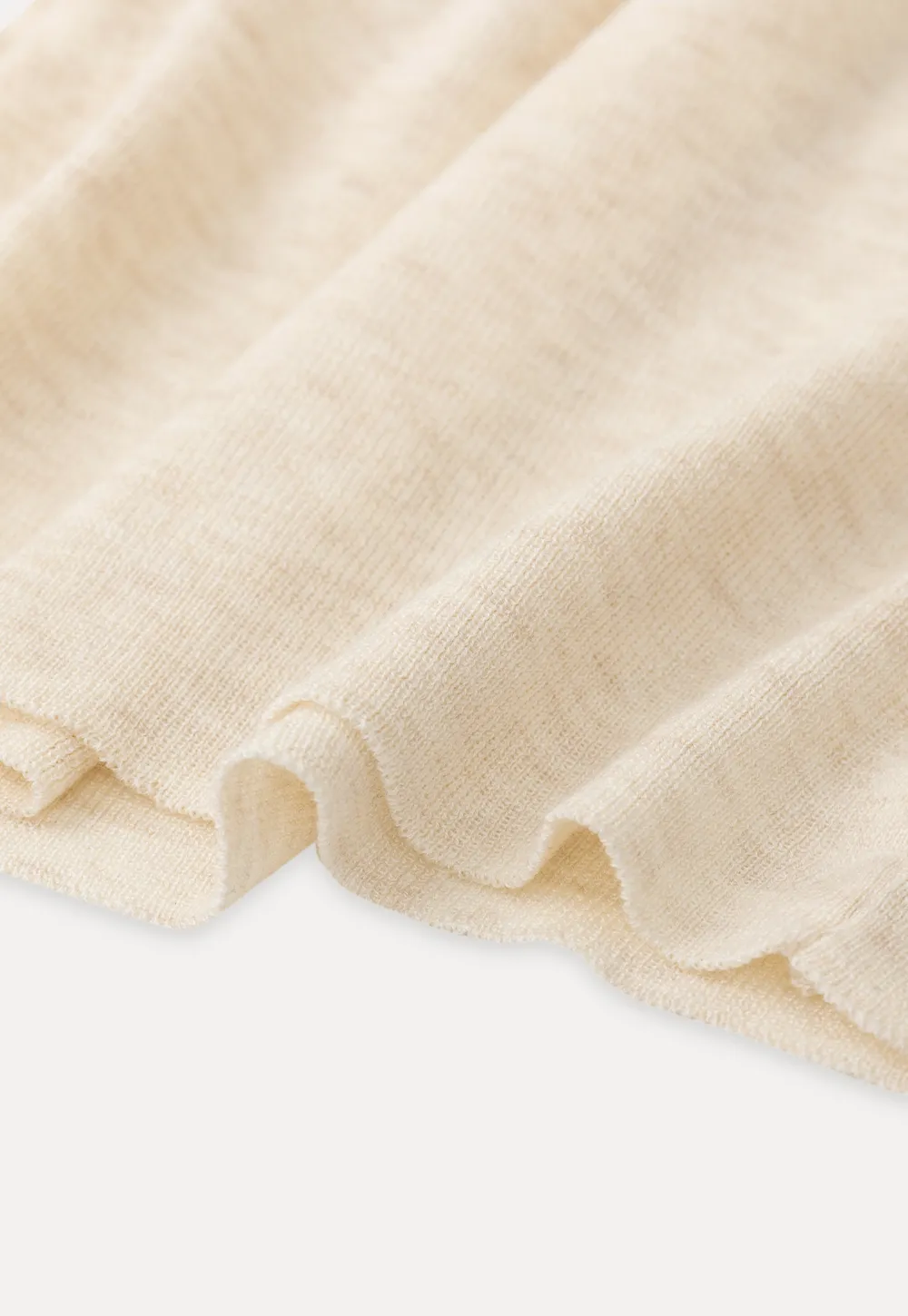 Silk-like tank top with thin straps and draped neckline