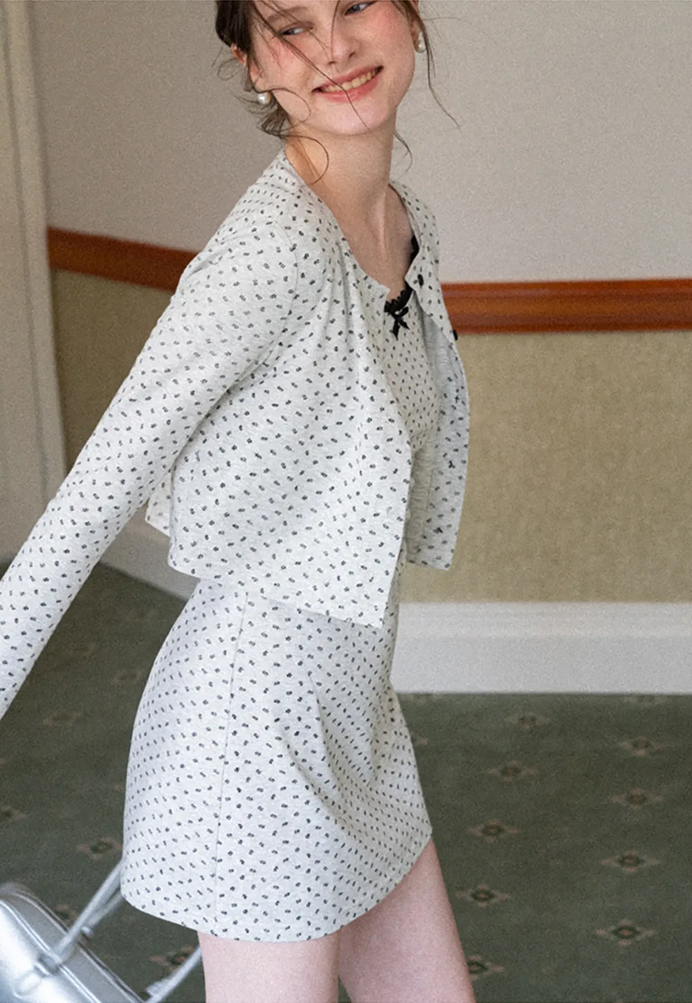 Polka dot dress with lace trim and matching cardigan