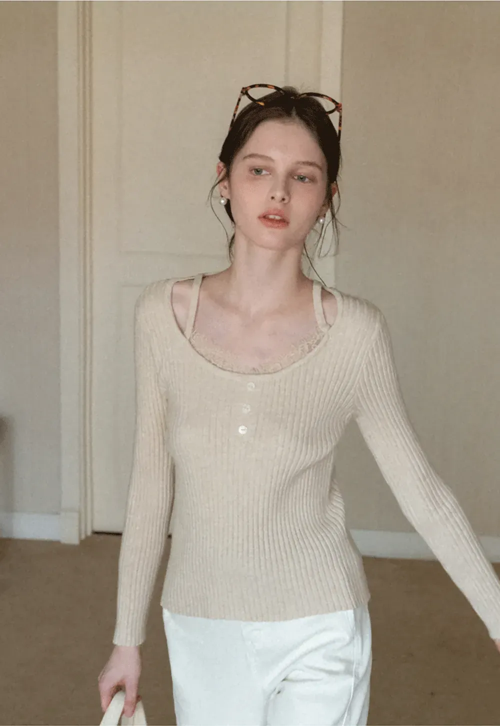 Ribbed knit sweater with boat neck and long sleeves