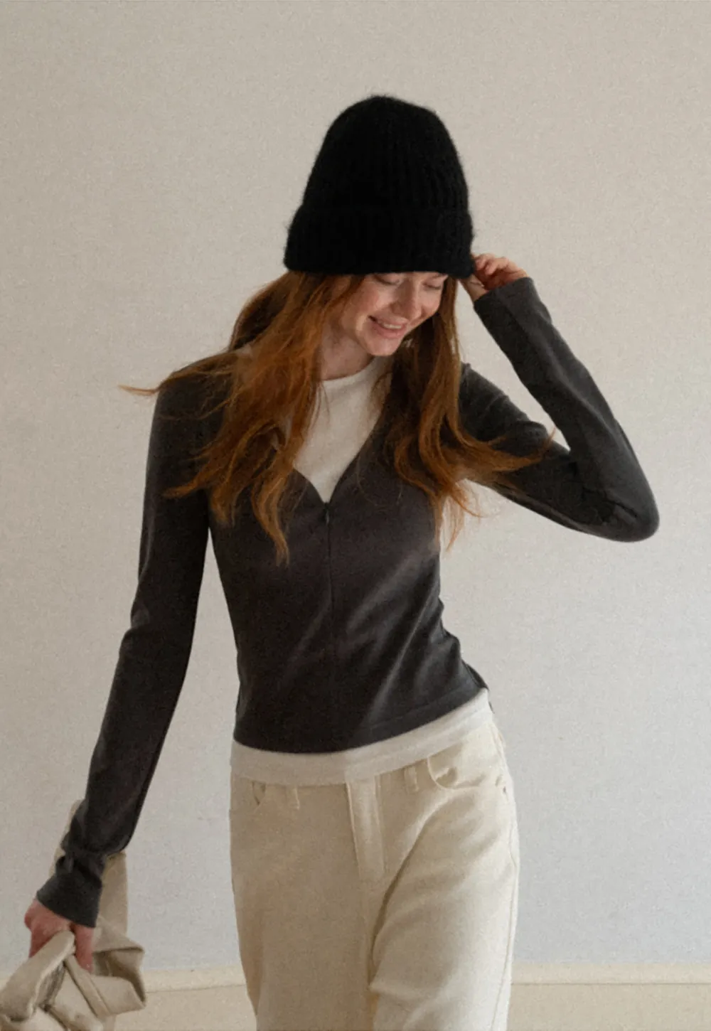 Long sleeve crop top with round neck and hem stitching design