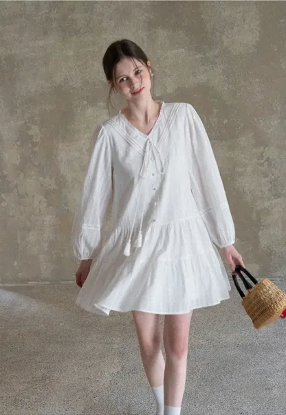 V neck long sleeve tiered dress with lace trim