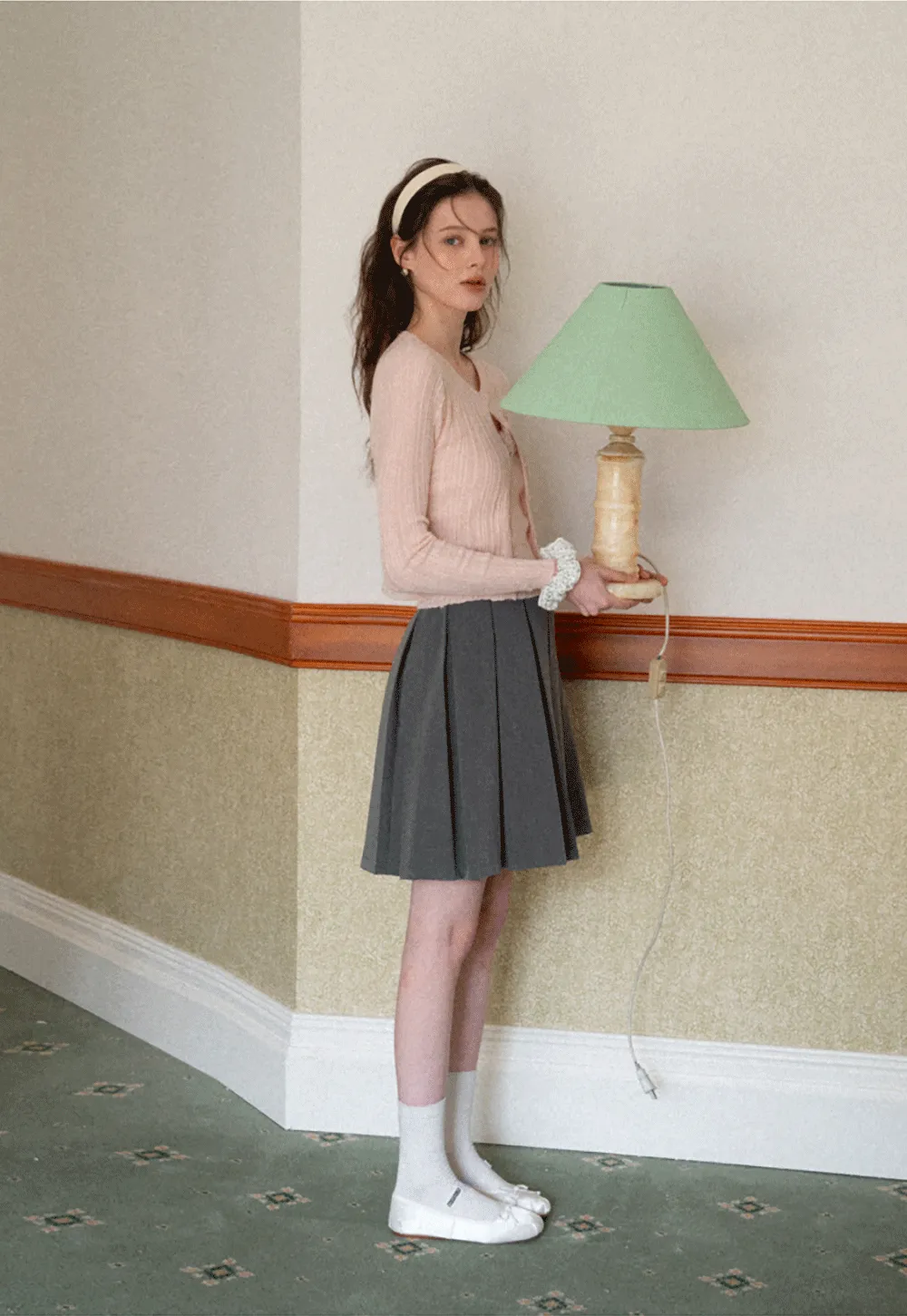 Ribbed knit sweater with V neckline and long sleeves