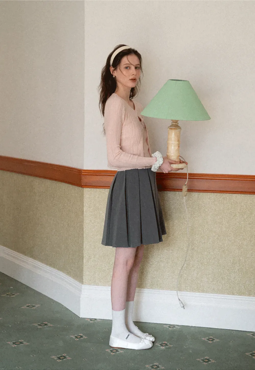 Ribbed knit sweater with V neckline and long sleeves