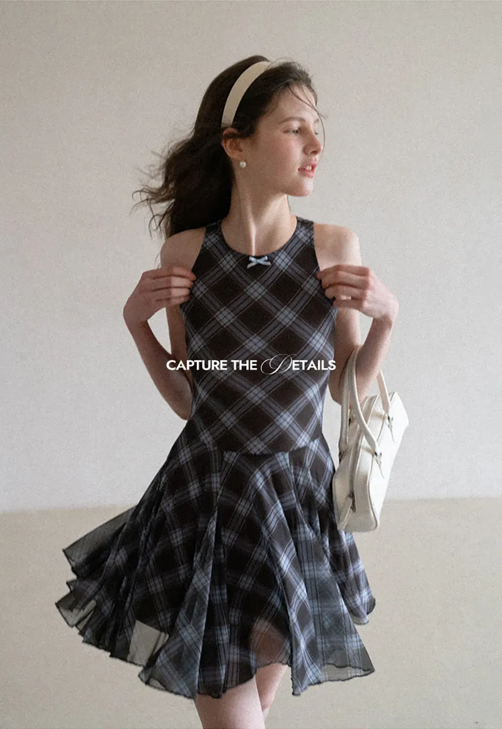 Plaid sleeveless dress with flared skirt